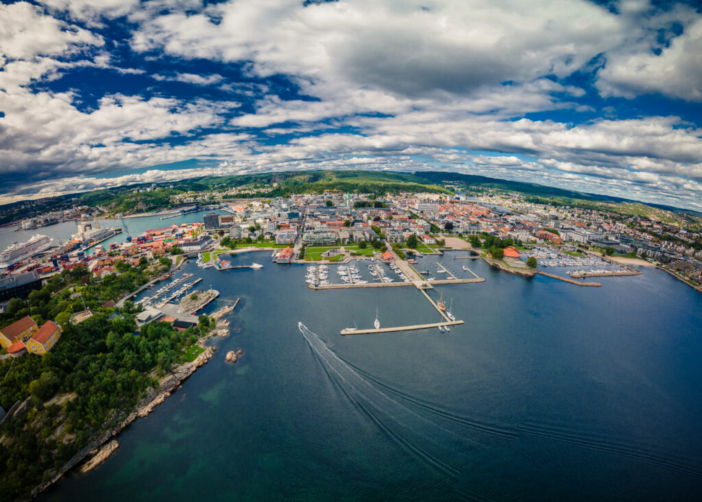 Drone view of Kristiansand town and Kvadraturen from Oderoya, Norway